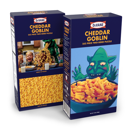 CHEDDAR GOBLIN MACARONI & CHEESE 252 Pc 2 Sided Puzzle